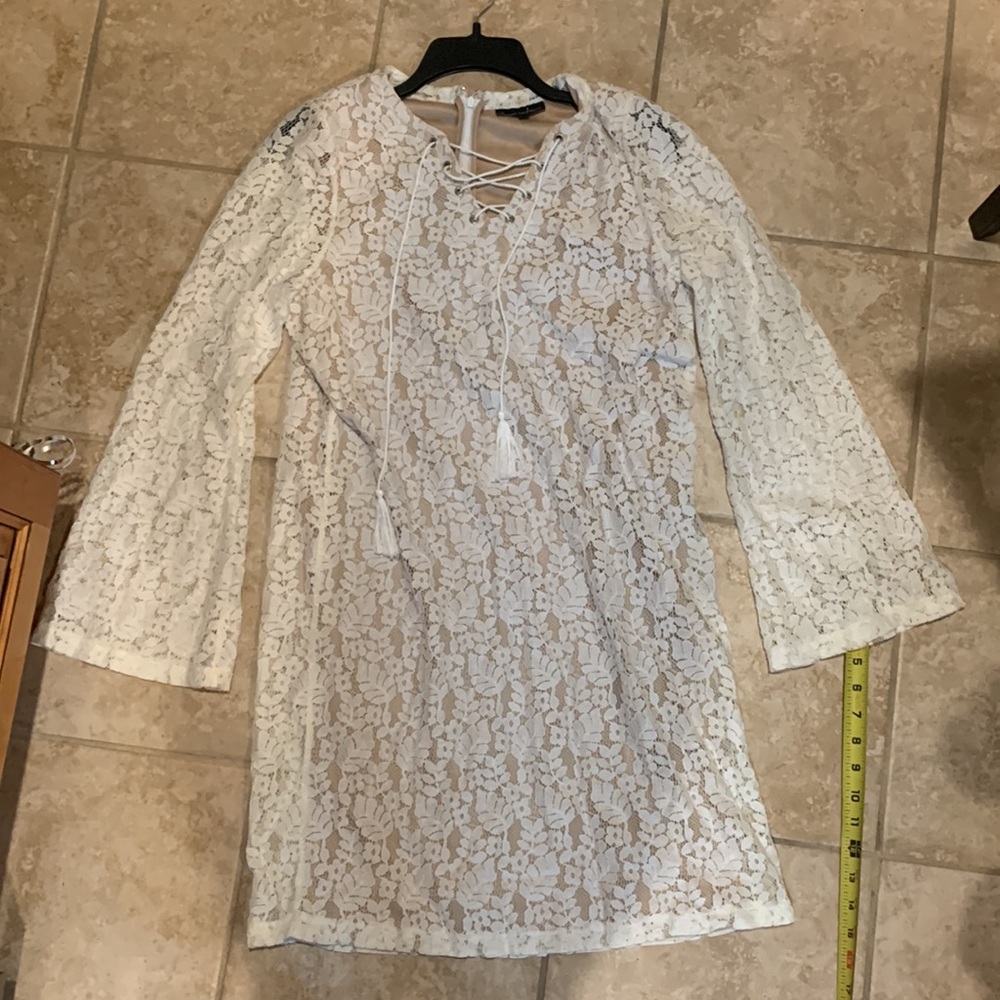 Cream lace mini dress with nude color lining Large